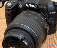 Nikon D3000 me lens 18- 55mm VR
