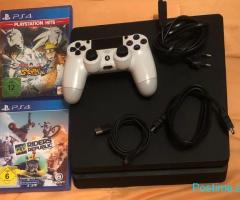 PlayStation 4 Slim 1TB – Me 1 Komandë Originale + 2 Lojëra