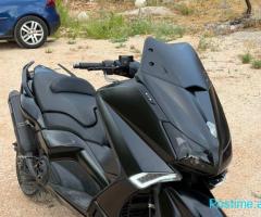 T max
