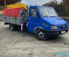 Transporte me kamjon me vinç dhe kamjonçine me vinç