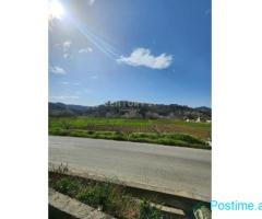 Tokë për Shitje buze rruge në Maknor Peze Helmes e Tiranës -
