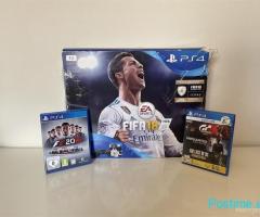 PS4 Slim ne kuti 1 terabyte me dy leva dhe lojra