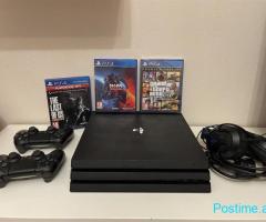 Ps4 Pro me GTA 5 te re në qese me dy leva dhe super lojra